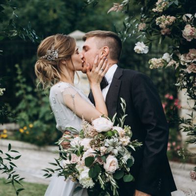 Groom,Kissing,Bride,On,Wedding,Ceremony Groom,Kissing,Bride,On,Wedding,Ceremony